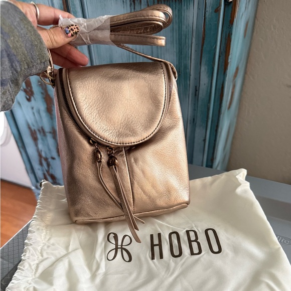 HOBO Handbags - HOBO Fern Metallic Rose Gold Crossbody Bag